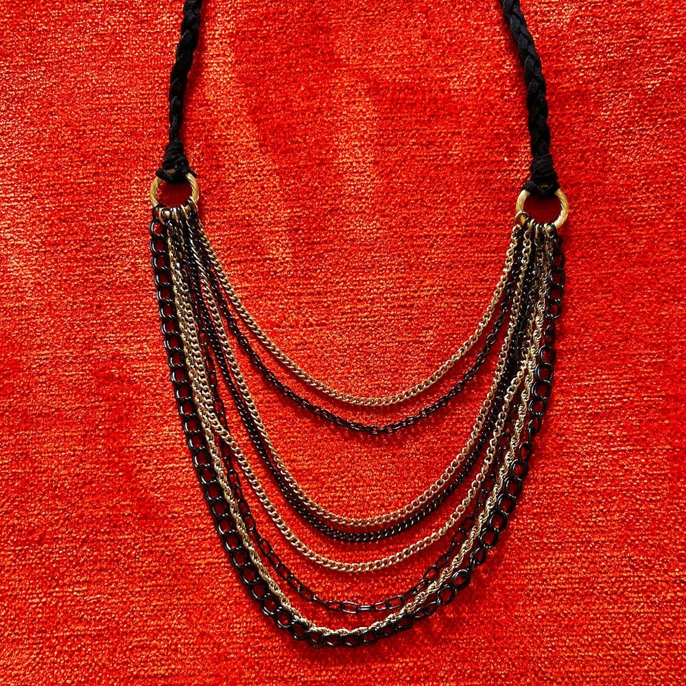 Tiered Black and Gold Chains on a Black Braided Felt Necklace